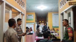 Pamatwil dan Kapolsek Pino Pantau Rekapitulasi Penghitungan Suara di PPK Ulu Manna    